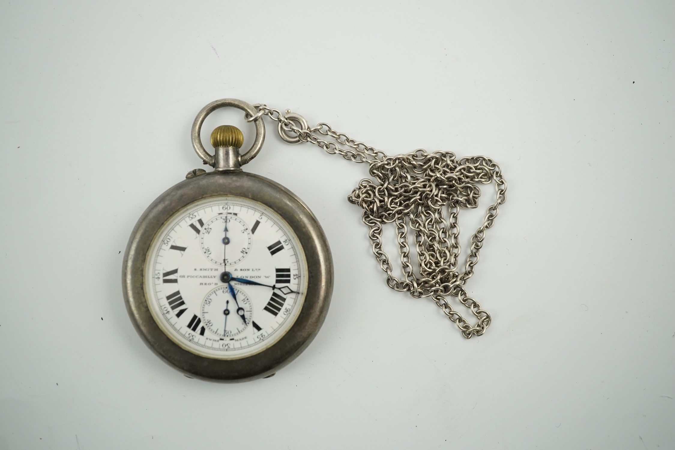 A George V silver open farce keyless pocket watch, by S. Smith & Son, with two subsidiary dials, case diameter 45mm, with a sterling chain. Condition - poor